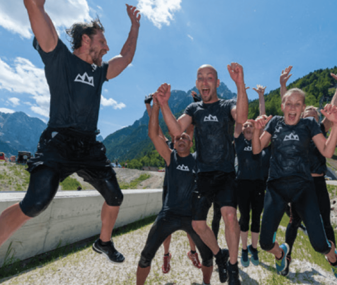 A group of founders jumps in the air in excitement
