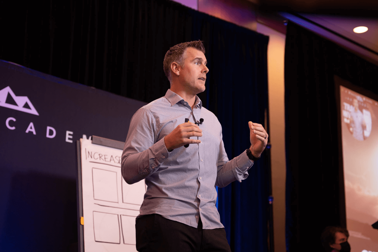 Dan Martell gesturing during a presentation
