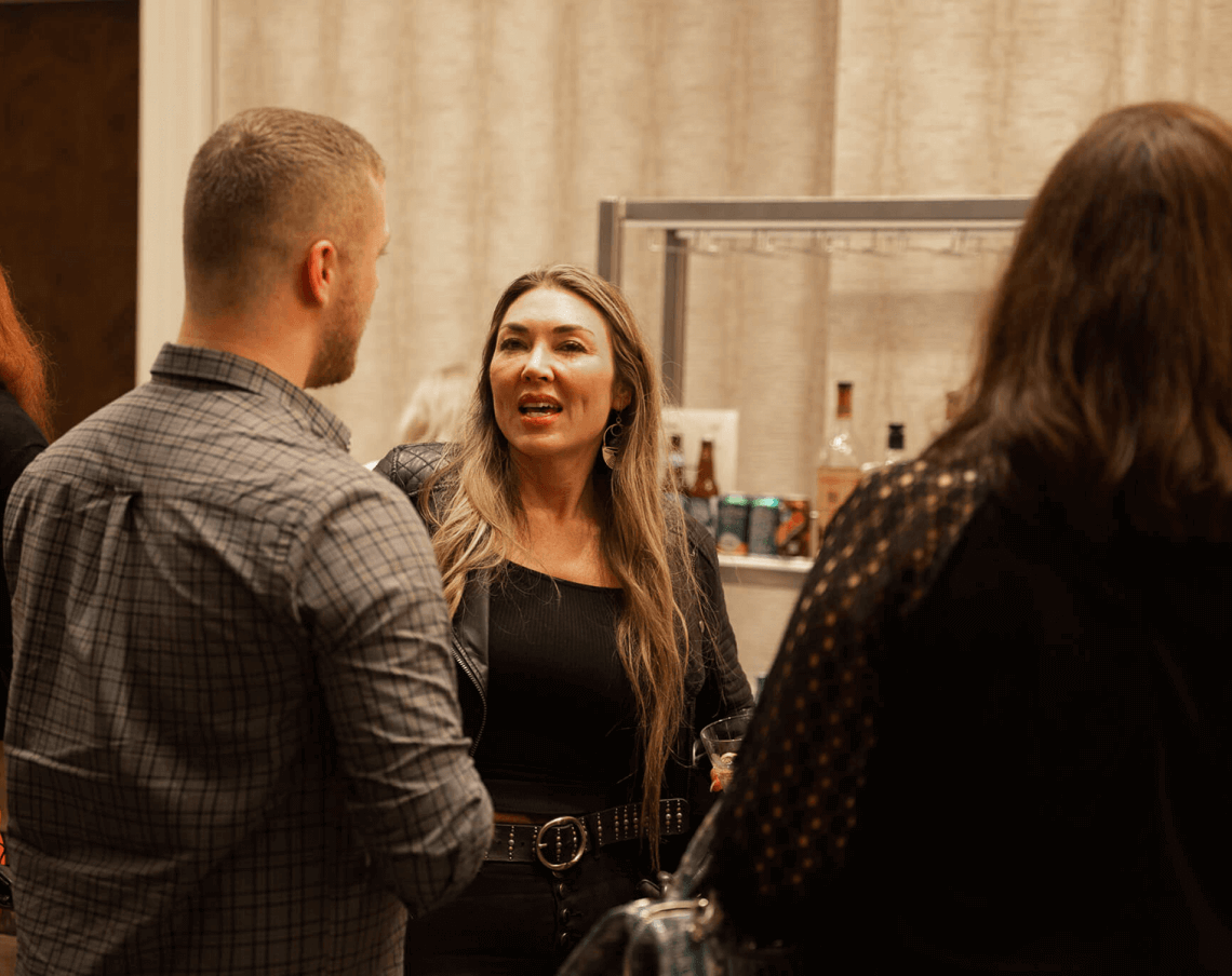 Two Growth Accelerator Program attendees in conversation